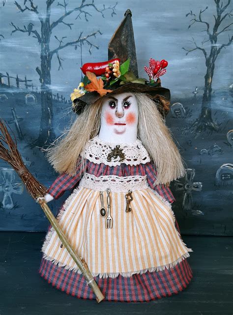 The symbolism behind large witch dolls